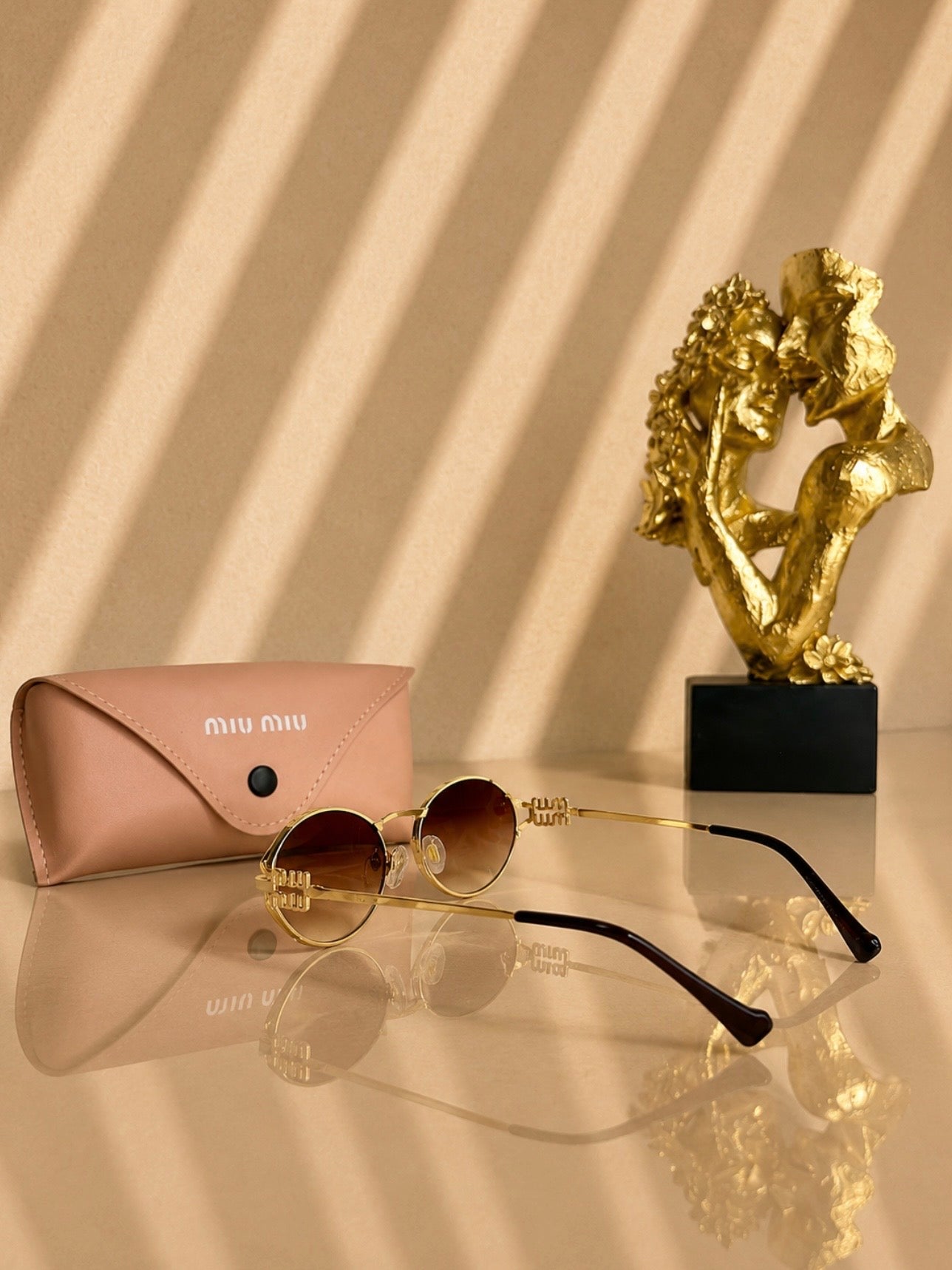 Sunglasses Miu/Miu Gold SG2
