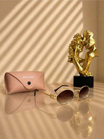 Sunglasses Miu/Miu Gold SG2