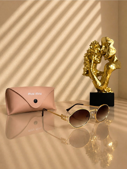 Sunglasses Miu/Miu Gold SG2